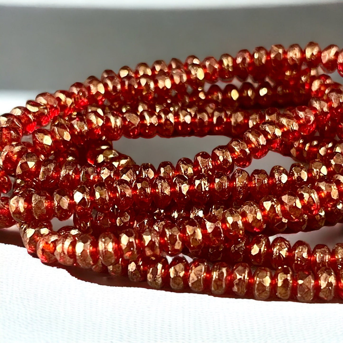 Czech Glass Beads - 4x2.5mm Faceted Ruby Red Rondelles, Transparent Red with Golden Luster (RON3/N-0681) * Qty. 50