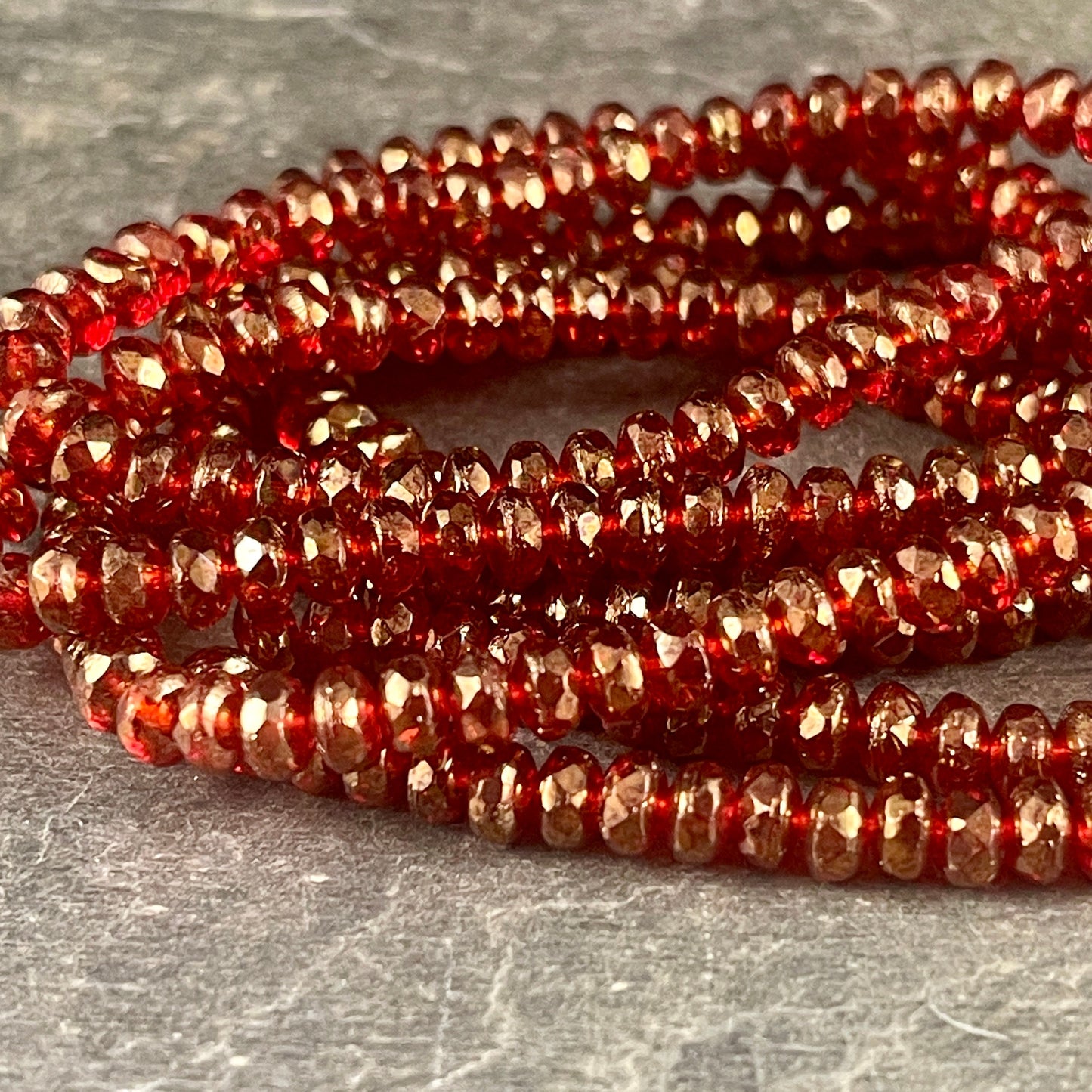Czech Glass Beads - 4x2.5mm Faceted Ruby Red Rondelles, Transparent Red with Golden Luster (RON3/N-0681) * Qty. 50