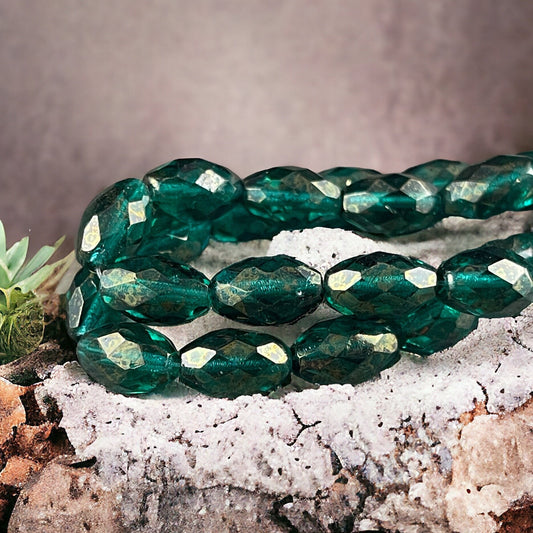 Emerald Green Faceted Oval Beads, 12mm Transparent Green with Golden Luster (FOV/N-1222) * Qty. 12