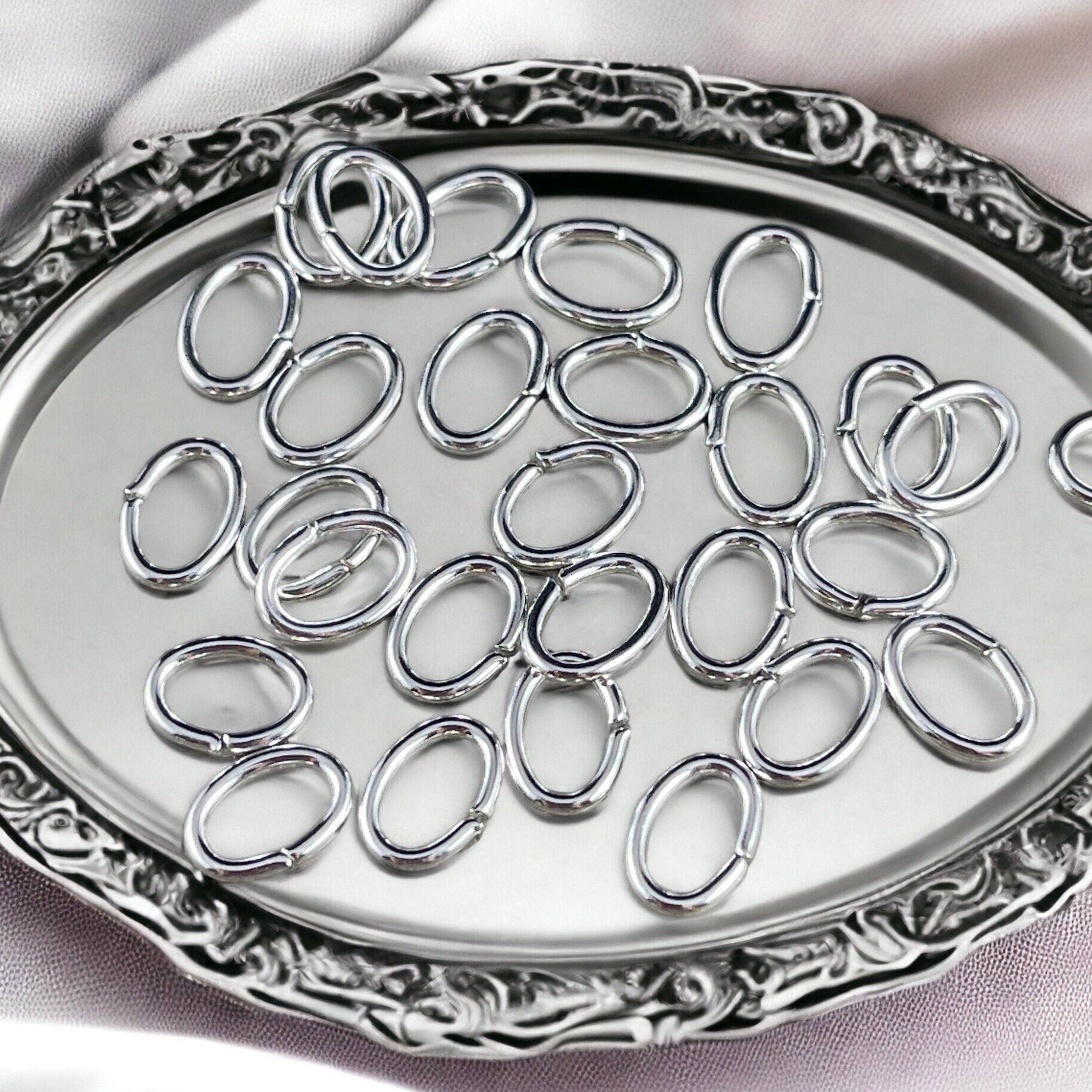 7x5mm Oval Jump Rings, 18g Open, Silver Plated Brass (FMG/5158) * Qty. 100
