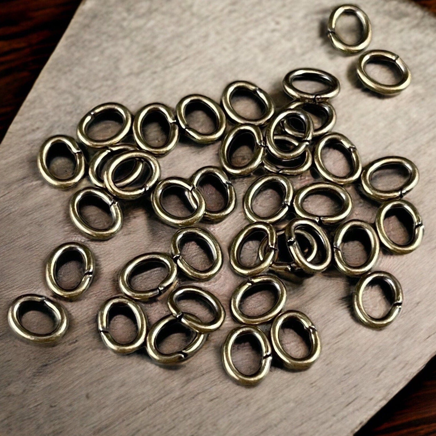 6x4mm Oval Jump Rings, 18g Open, Antiqued Brass Plated (FMG/5054) * Qty. 100