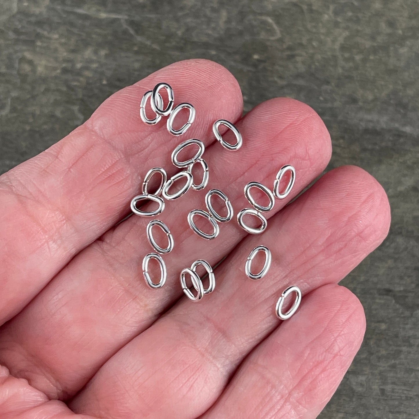 6x4mm Oval Jump Rings, 18g Open, Silver Plated Brass (FMG/9910) * Qty. 100