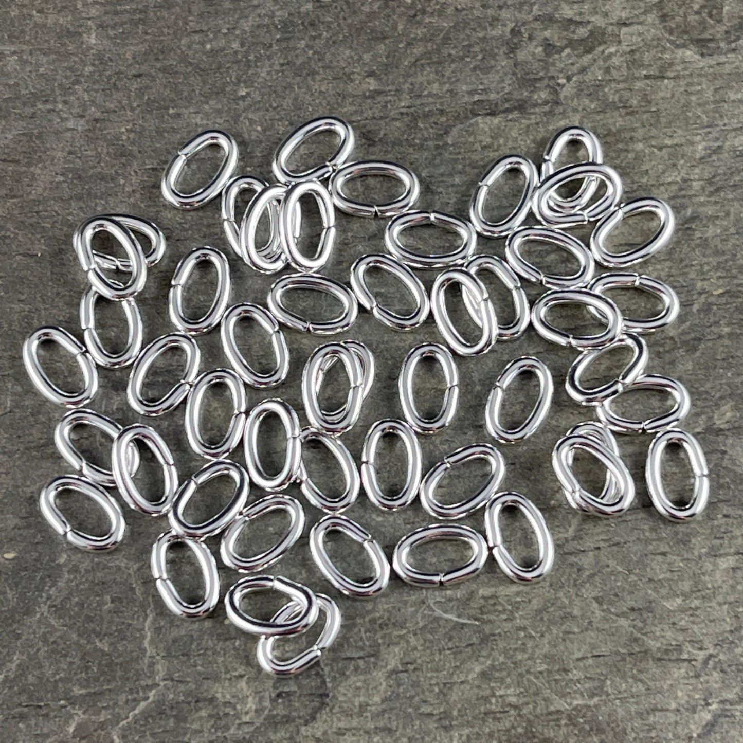 6x4mm Oval Jump Rings, 18g Open, Silver Plated Brass (FMG/9910) * Qty. 100