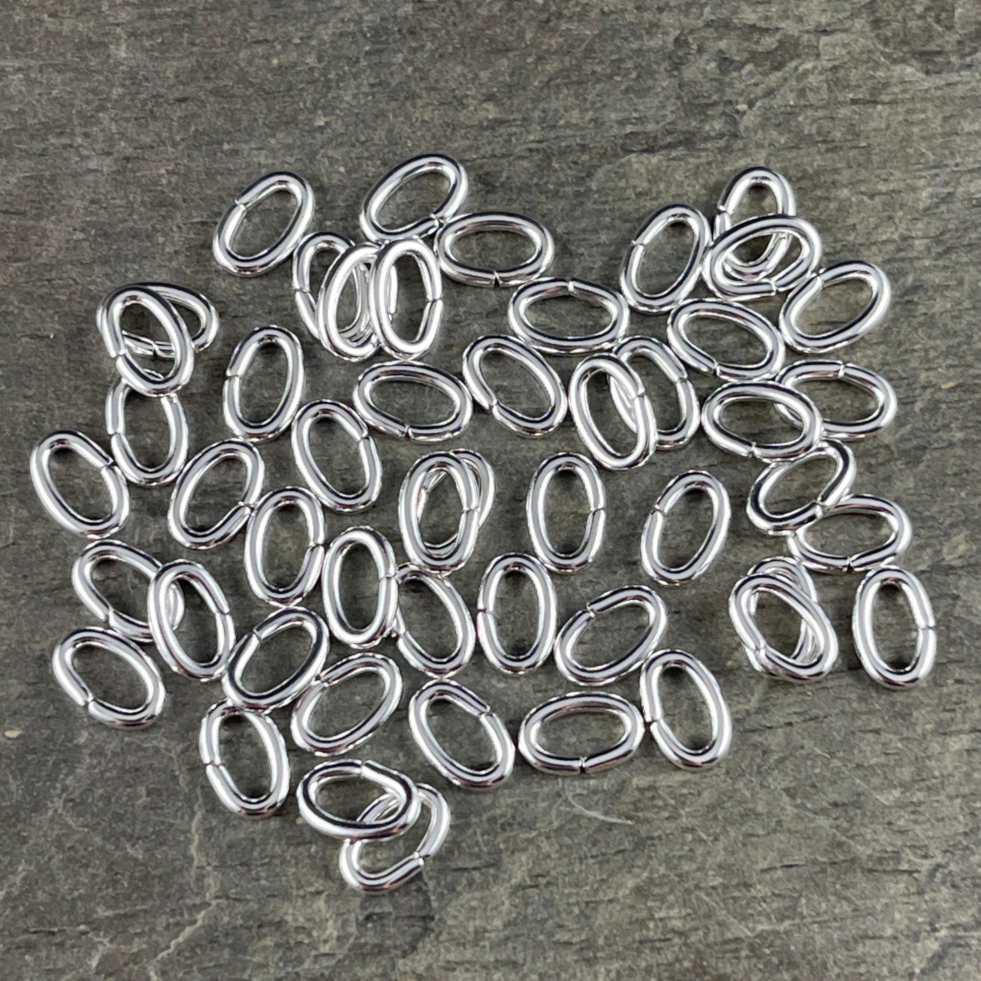 6x4mm Oval Jump Rings, 18g Open, Silver Plated Brass (FMG/9910) * Qty. 100