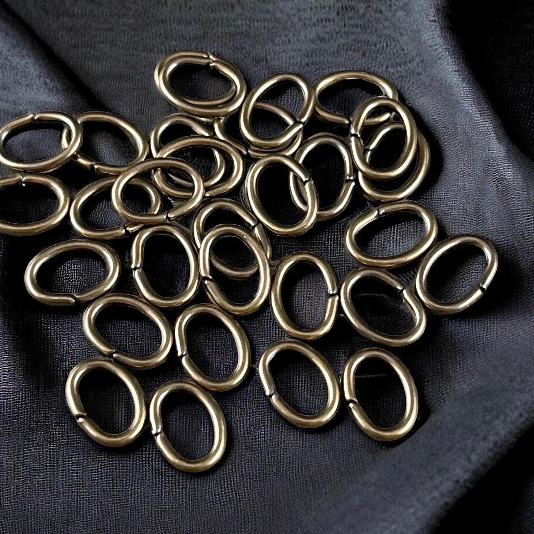 8x6mm Brass Oval Jump Rings ~ 18g Oval Jump Rings ~ Brass Bronze Jump Rings ~ Antiqued Brass Open Jump Rings (FMG/5063) * Qty. 100