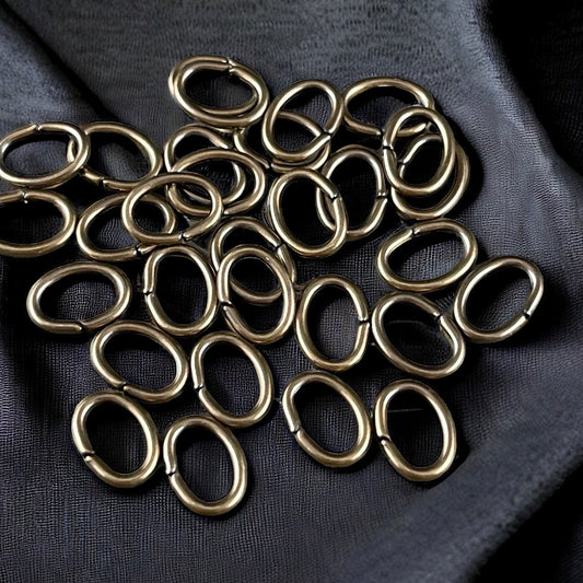 8x6mm Oval Jump Rings, 18g Open, Antiqued Brass Plated (FMG/5063) * Qty. 100