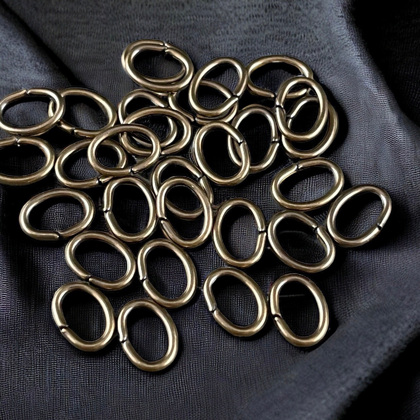 8x6mm Oval Jump Rings, 18g Open, Antiqued Brass Plated (FMG/5063) * Qty. 100