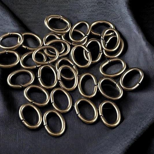 8x6mm Oval Jump Rings, 18g Open, Antiqued Brass Plated (FMG/5063) * Qty. 100
