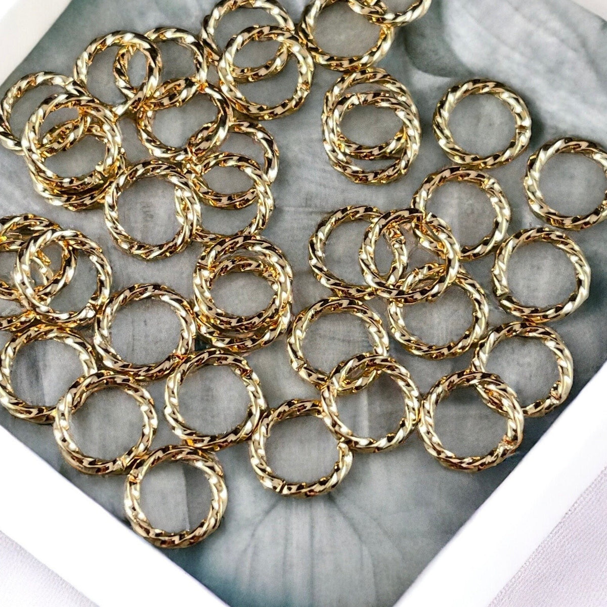 8mm Twisted Jump Rings, 16g Open, Gold Plated Brass (FMG/5028) * Qty. 50