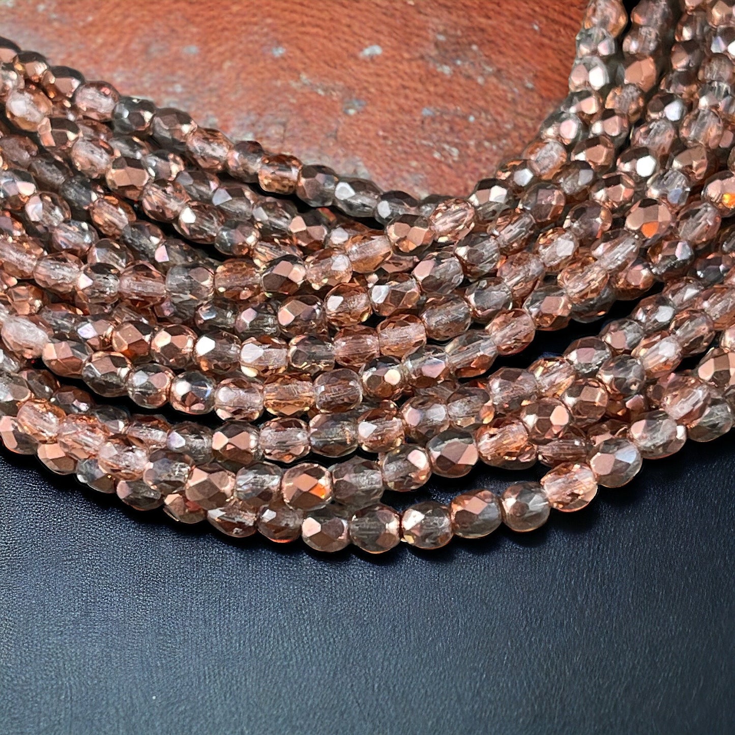 Crystal with Rose Gold Metallic Half Coat 4mm Faceted Round Beads - Clear and Rose Gold Beads (FP4/SM-27101) * Qty. 50