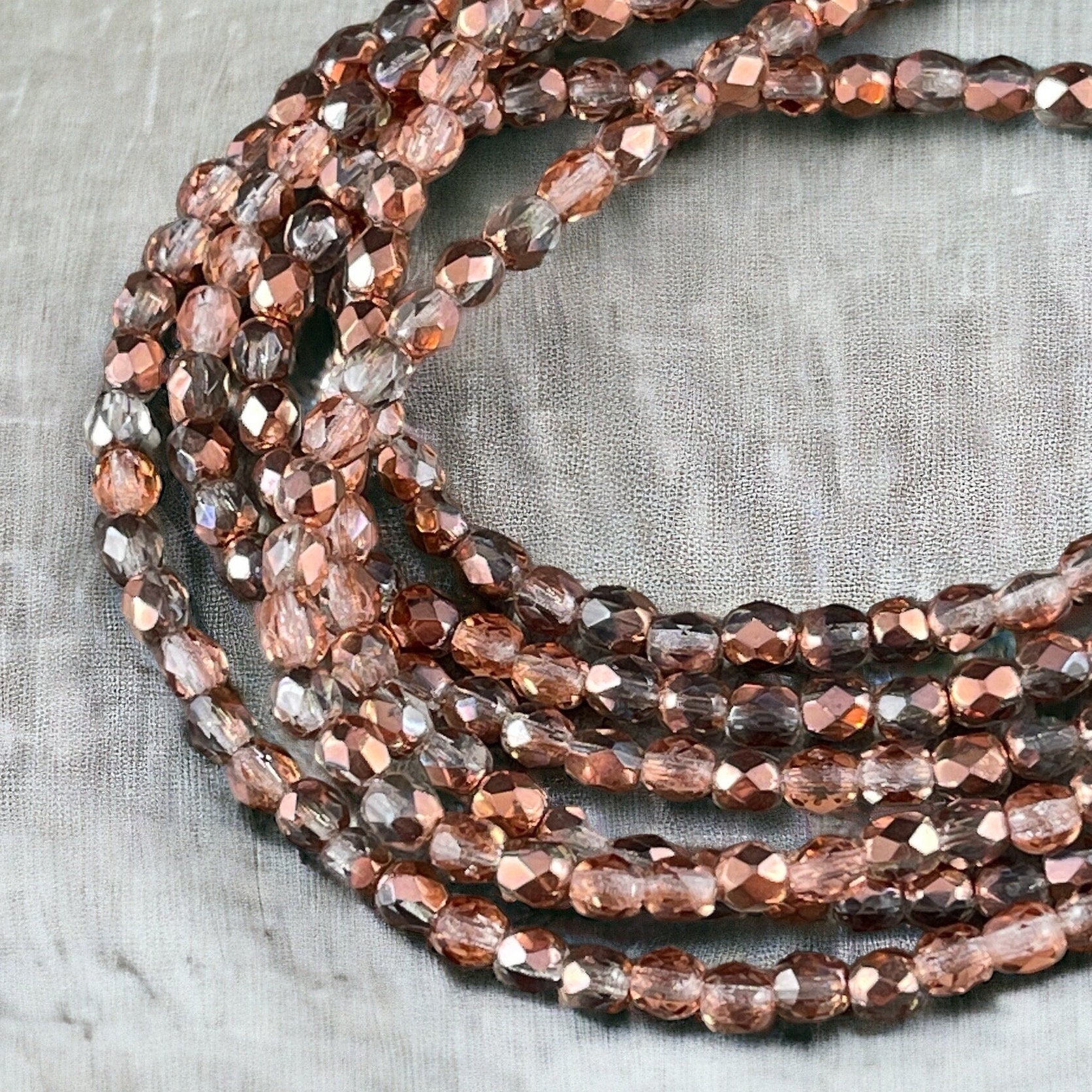 Crystal with Rose Gold Metallic Half Coat 4mm Faceted Round Beads - Clear and Rose Gold Beads (FP4/SM-27101) * Qty. 50