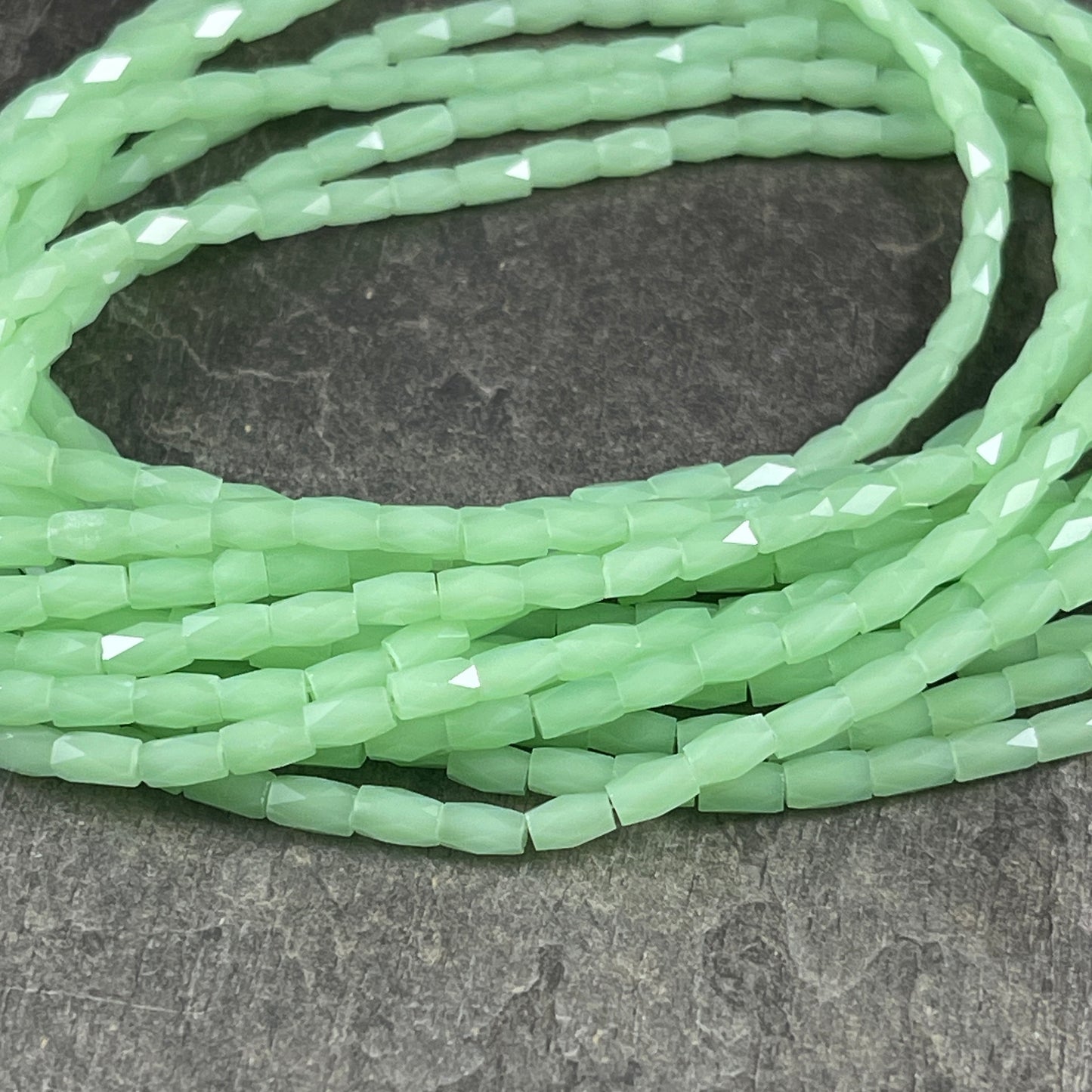 Small Faceted Glass Beads 5mm Faceted Tube Beads Pale Green AB Luster 5x3mm Tube Beads Light Green Luster Beads (FGT-LGAB) - 18" Strand