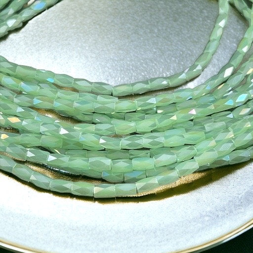 Small Faceted Glass Beads 5mm Faceted Tube Beads Pale Green AB Luster 5x3mm Tube Beads Light Green Luster Beads (FGT-LGAB) - 18" Strand