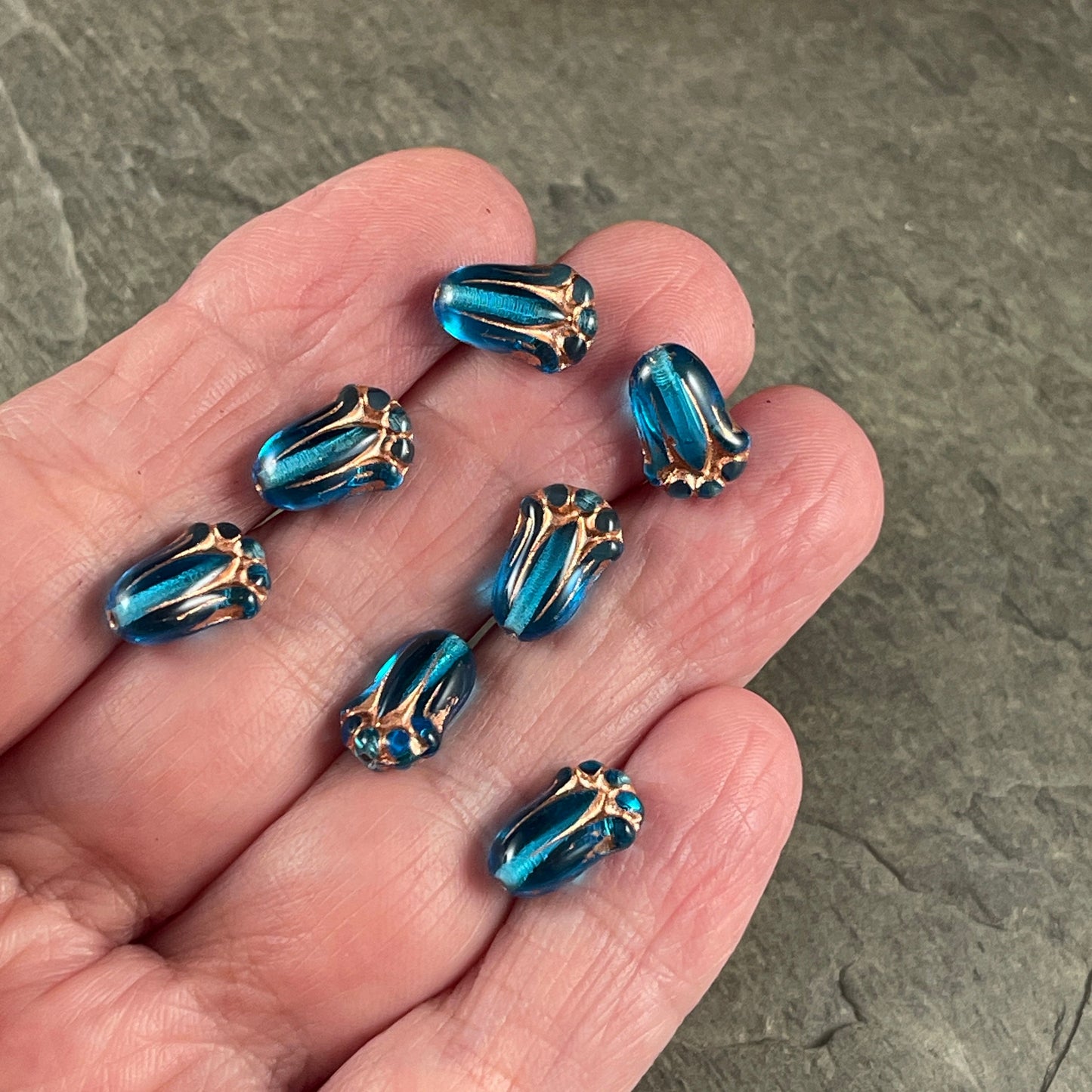 Capri Blue Czech Glass Flower Beads, 12x8mm Lily Bud, Transparent Blue with Copper Wash (LBud24) * Qty. 12