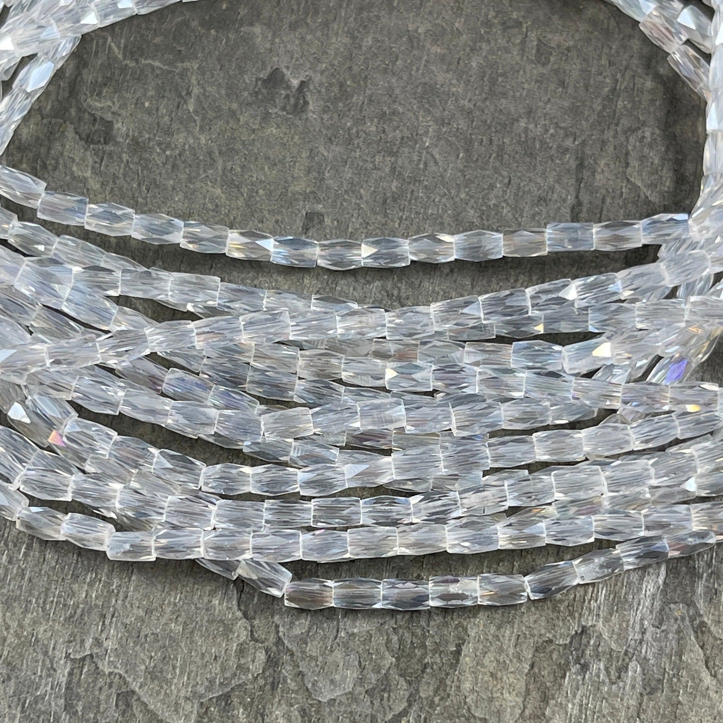 Crystal Clear AB 5mm Faceted Tube Beads, Transparent Crystal with AB Finish, 5x3mm Tube Beads (FGT-TCab1) * 18" Strand