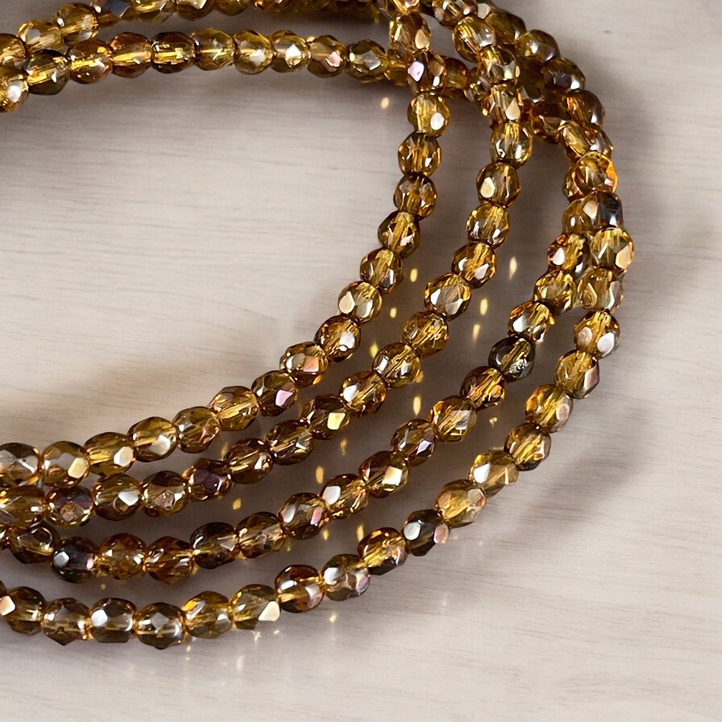 Czech Glass Beads - 4mm Fire Polished, Faceted Round Beads, Honey Golden, Topaz Luster (FP4/N-088) - Qty 50