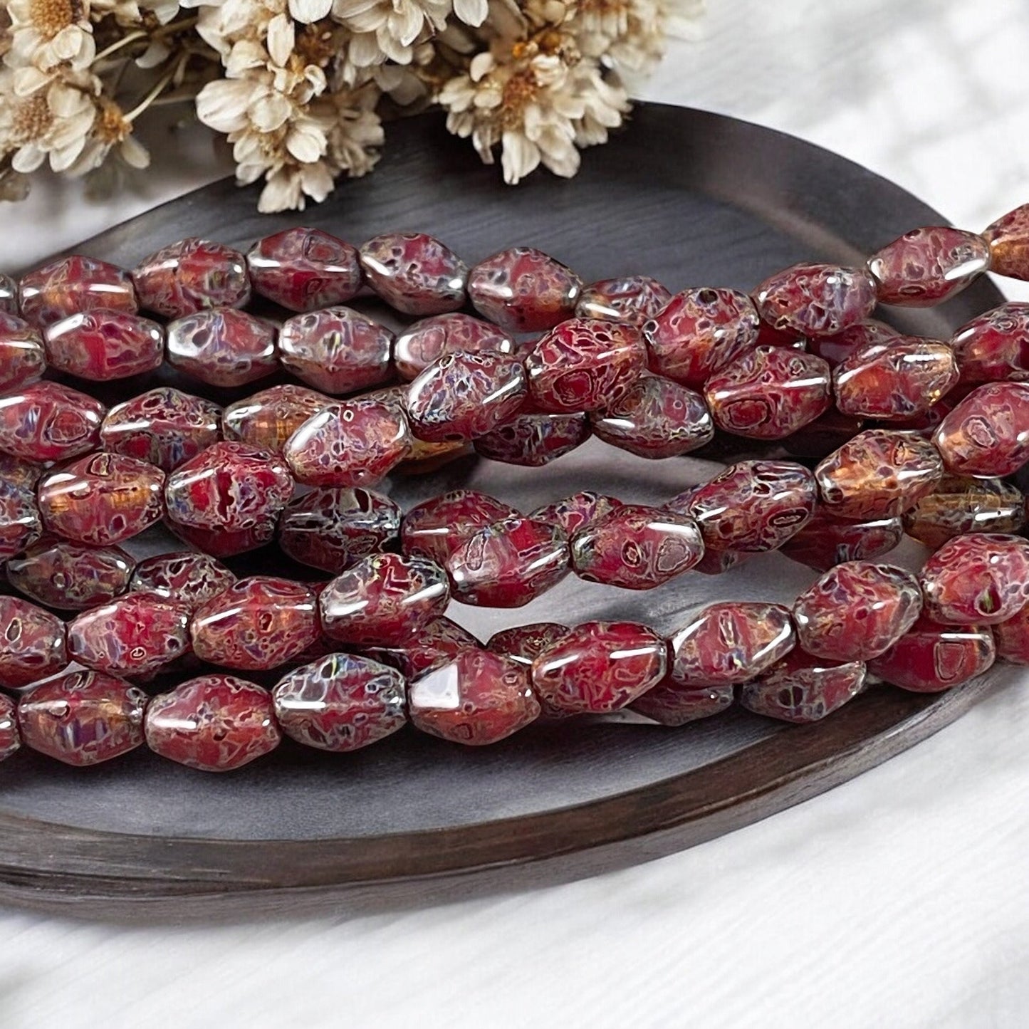 Czech Glass Beads - Transparent Crystal Red with Travertine Picasso , 8x6mm Dark Red, Rustic Picasso, Elongated Bicone (EB5) * Qty. 16