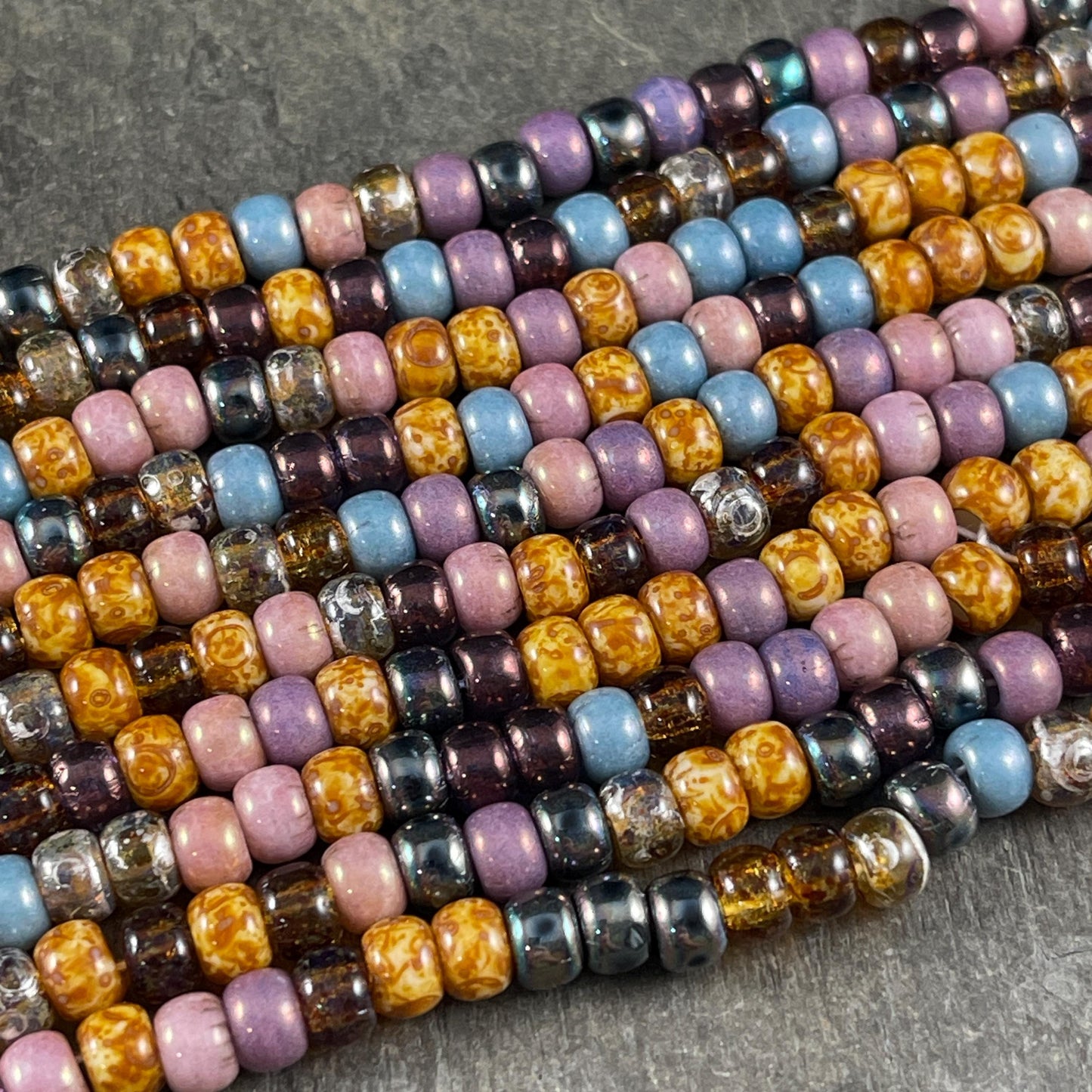 2/0 Tulip Picasso Luster, 6mm Picasso Seed Bead Mix with Pink, Purple, Topaz, Champagne, Beige and Gunmetal Beads (2/0-Tulip) * 20" Strand