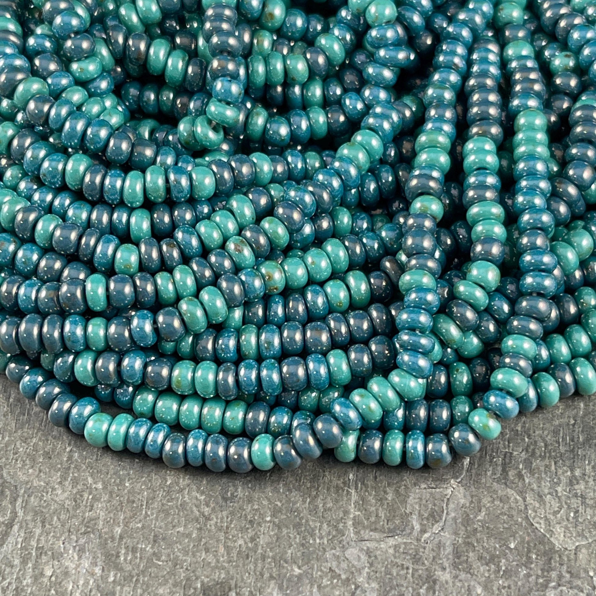 6/0 Picasso Seed Beads, 4mm Teal and Turquoise Aged Picasso Seed Bead Mix (6/0-Goblin) * 20" strand