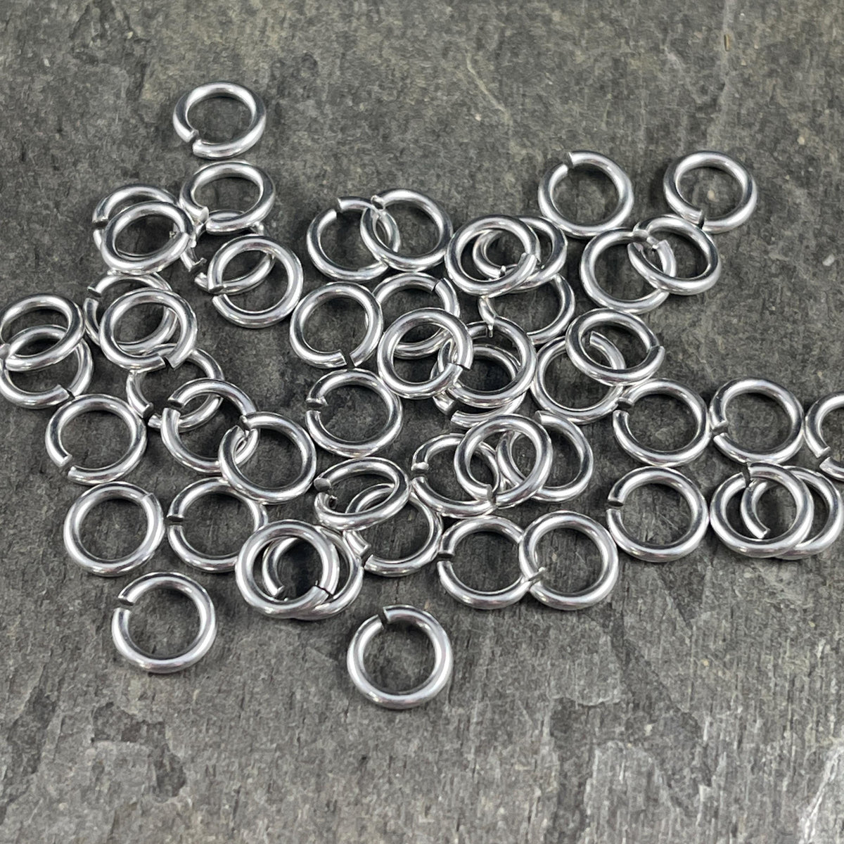 7mm Round Jump Rings, 16g Open, Silver Plated Brass (PF/300651-07-77) * Qty. 50