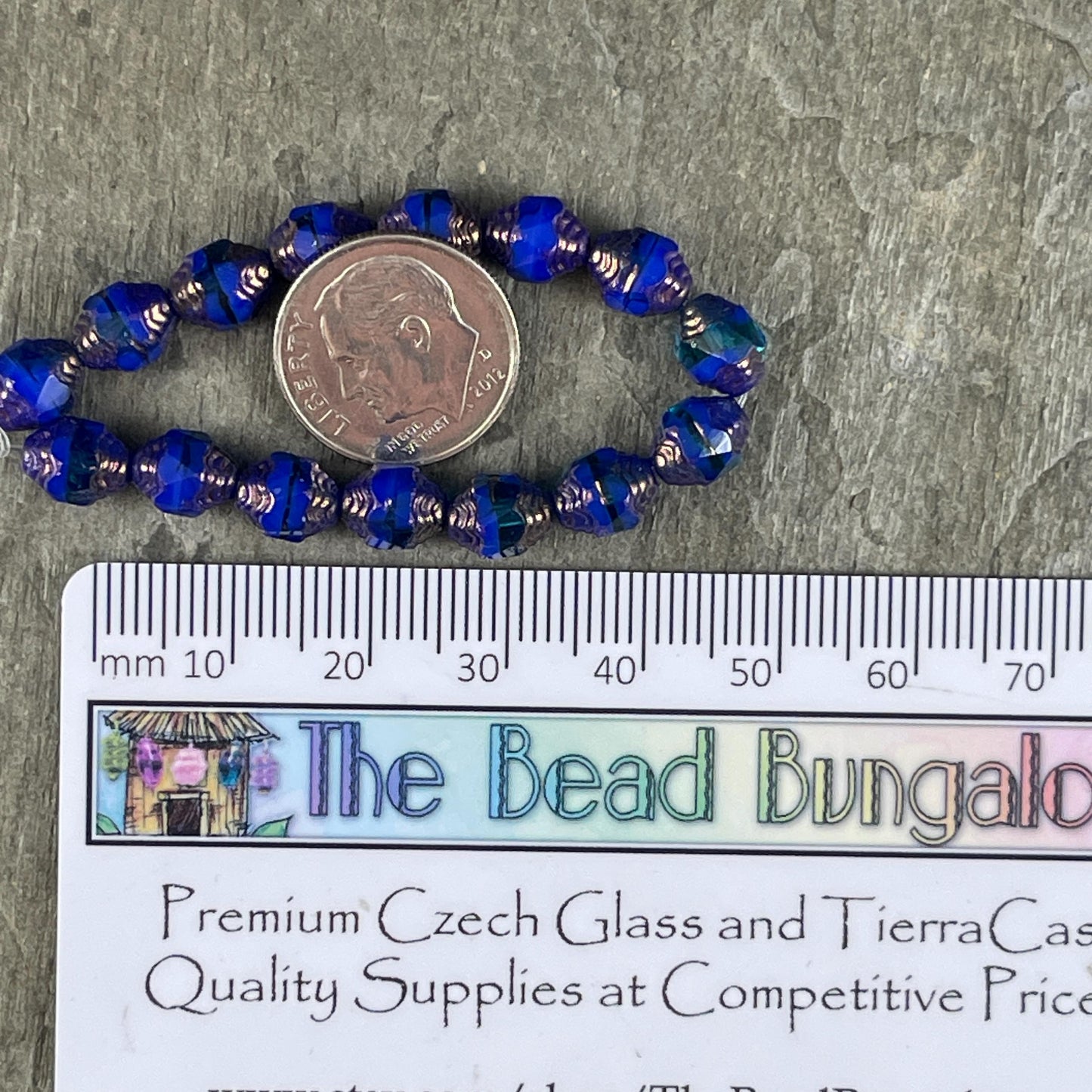 Czech Glass Beads, Royal Blue Cathedral 8x6mm Carved Oval Bicone (CTD/N-051) * Qty. 15