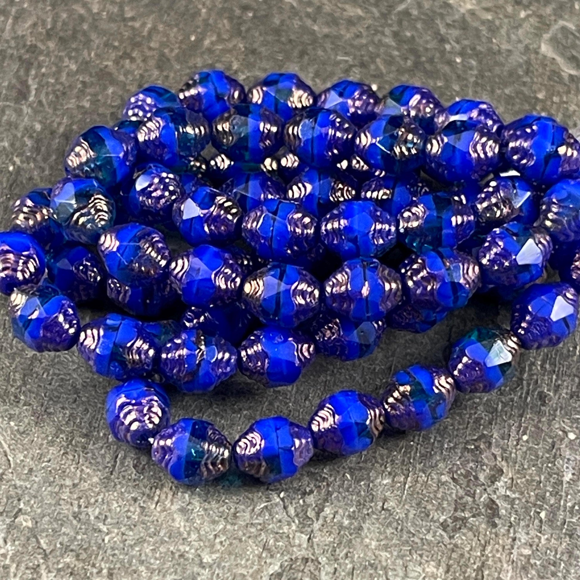 Czech Glass Beads, Royal Blue Cathedral 8x6mm Carved Oval Bicone (CTD/N-051) * Qty. 15