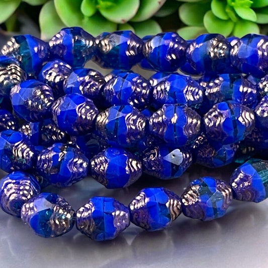 Czech Glass Beads - Royal Blue Cathedral 8x6mm Carved Oval Bicone (CTD/N-051) * Qty. 15