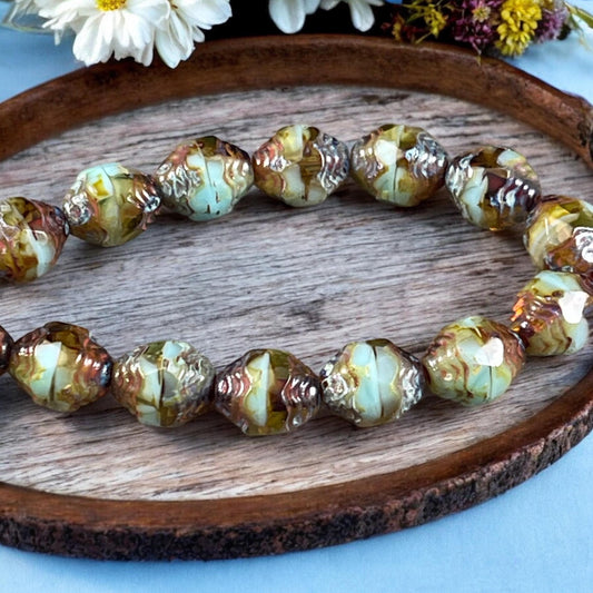 Czech Glass Beads - Sky Blue and Brown Picasso Cathedral 8x6mm Carved Oval Bicone (CTD/N-048) * Qty. 15