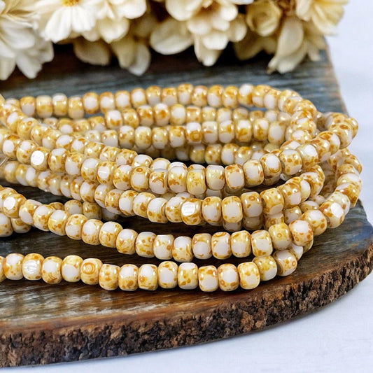 Czech Glass Beads - 4x3mm Tri-cut 6/0 Seed Bead, Ivory with Picasso (TRICA/N-1200) * Qty. 50