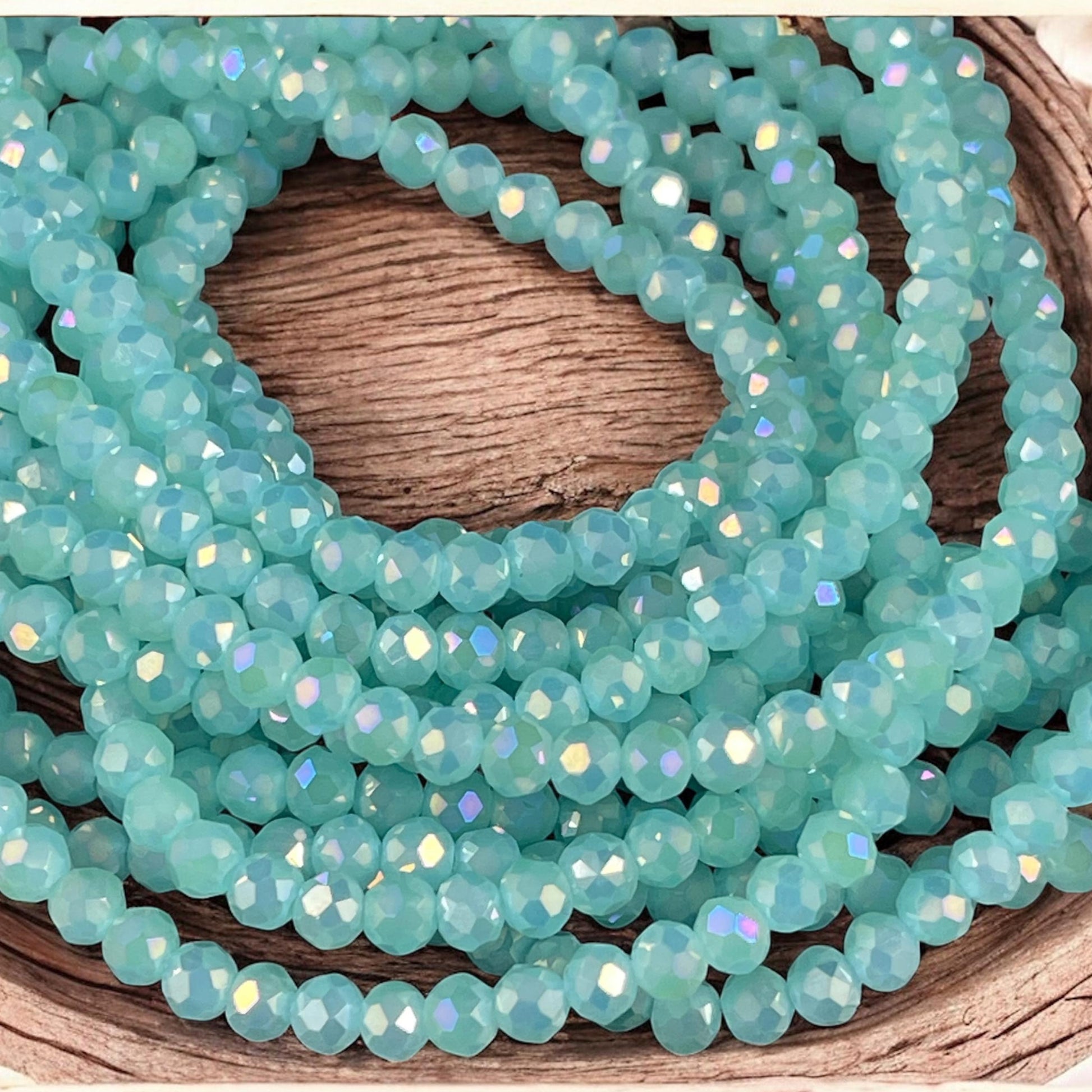 Pastel Green 4x3mm Faceted Glass Beads, Light Green with AB Finish (PastelGreenAB-4) * 100 Beads