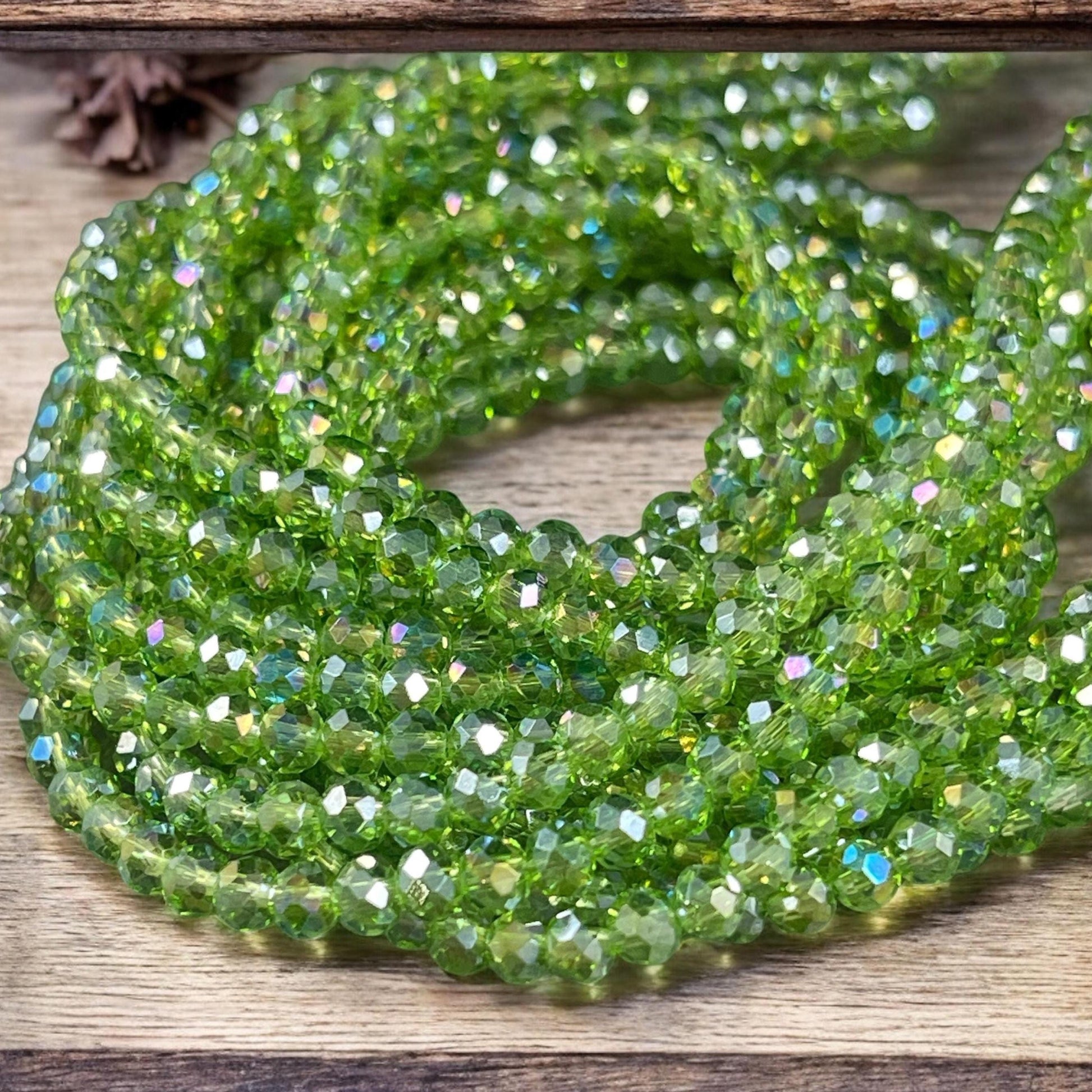 Transparent Green 4x3mm Faceted Glass Beads, Peridot Green with AB Finish (PeridotAB-4) * 100 Beads