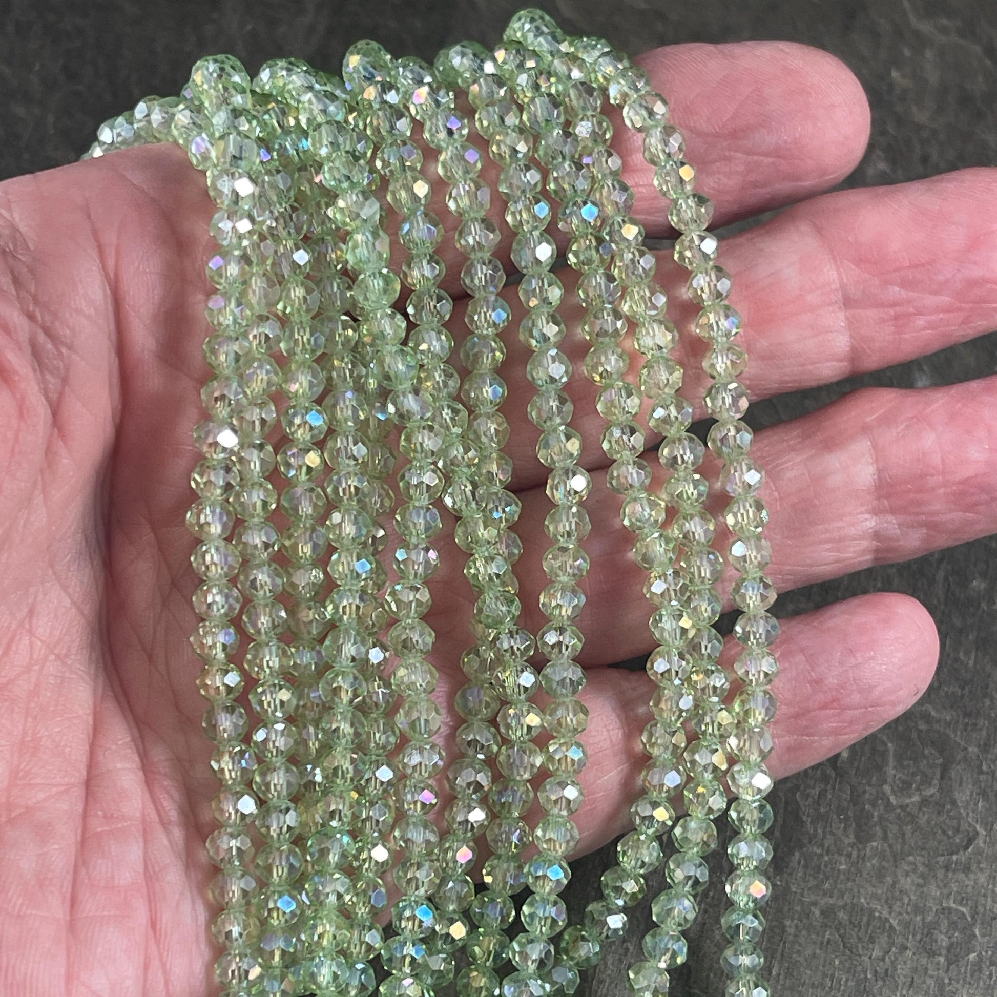Transparent Light Green 4x3mm Faceted Glass Beads, Pastel Green with AB Finish (LtGreenAB-4) * 100 Beads