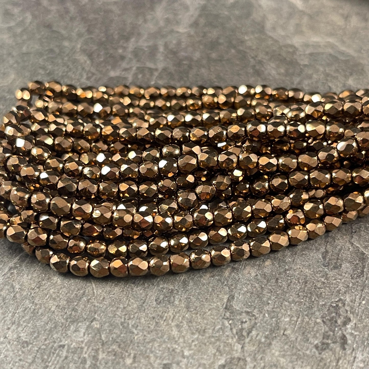 Czech Glass Beads - 4mm Metallic Bronze Faceted Glass Beads (FP4/N-114) * Qty. 50