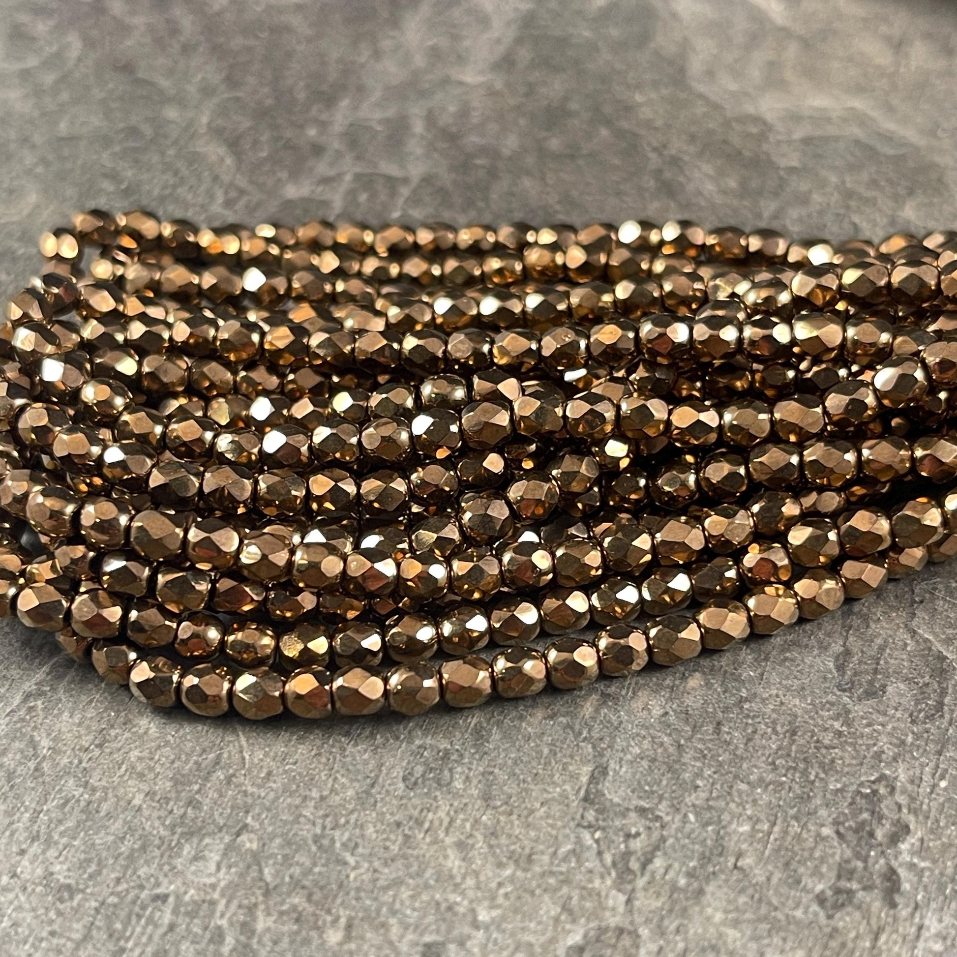 Czech Glass Beads - 4mm Metallic Bronze Faceted Glass Beads (FP4/N-114) * Qty. 50