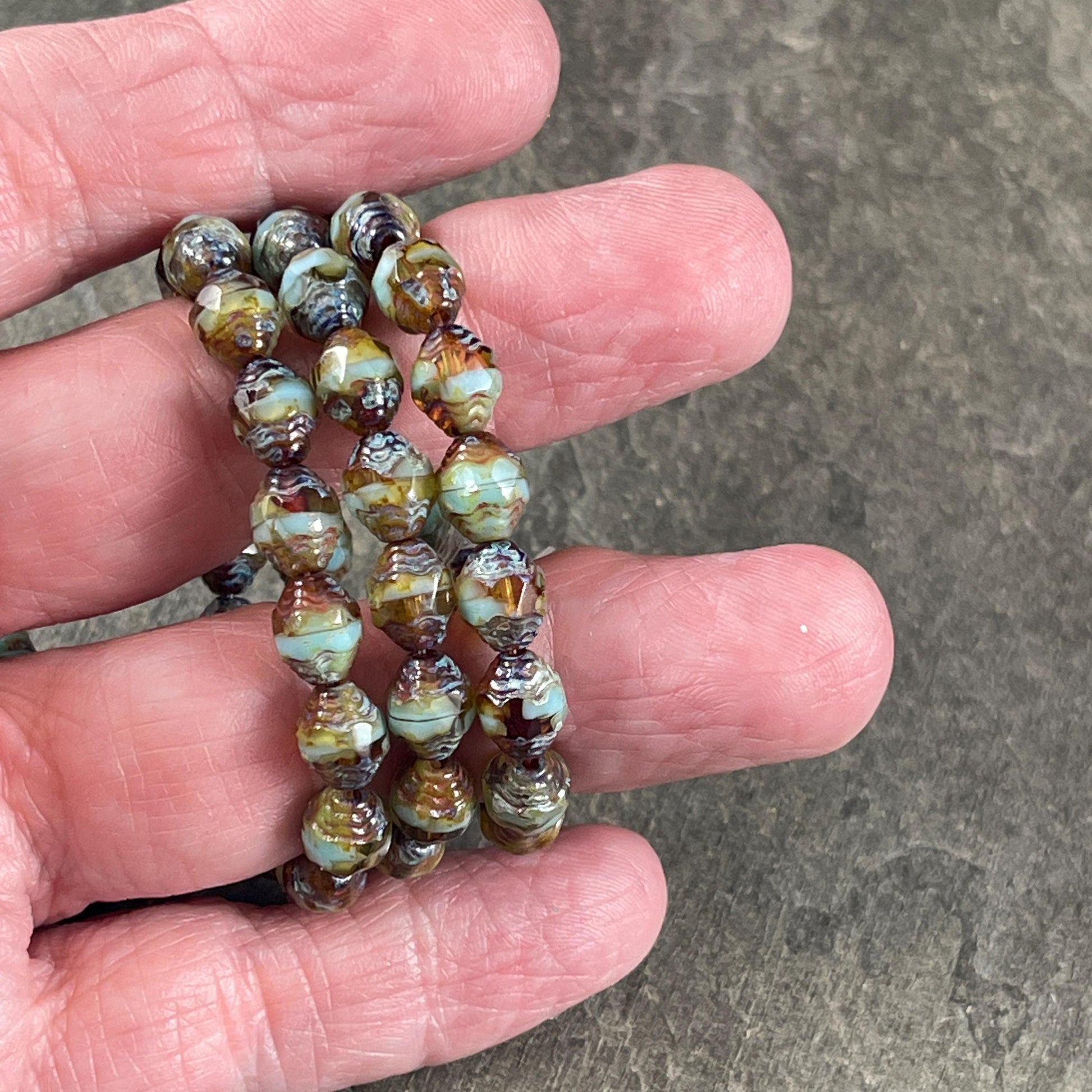 Czech Glass Beads - Sky Blue and Brown Picasso Cathedral 8x6mm Carved Oval Bicone (CTD/N-048) * Qty. 15