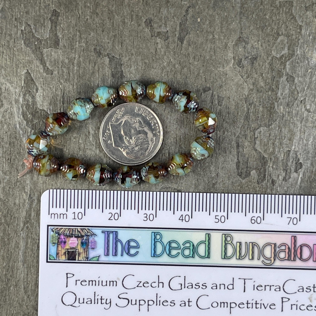 Czech Glass Beads - Sky Blue and Brown Picasso Cathedral 8x6mm Carved Oval Bicone (CTD/N-048) * Qty. 15