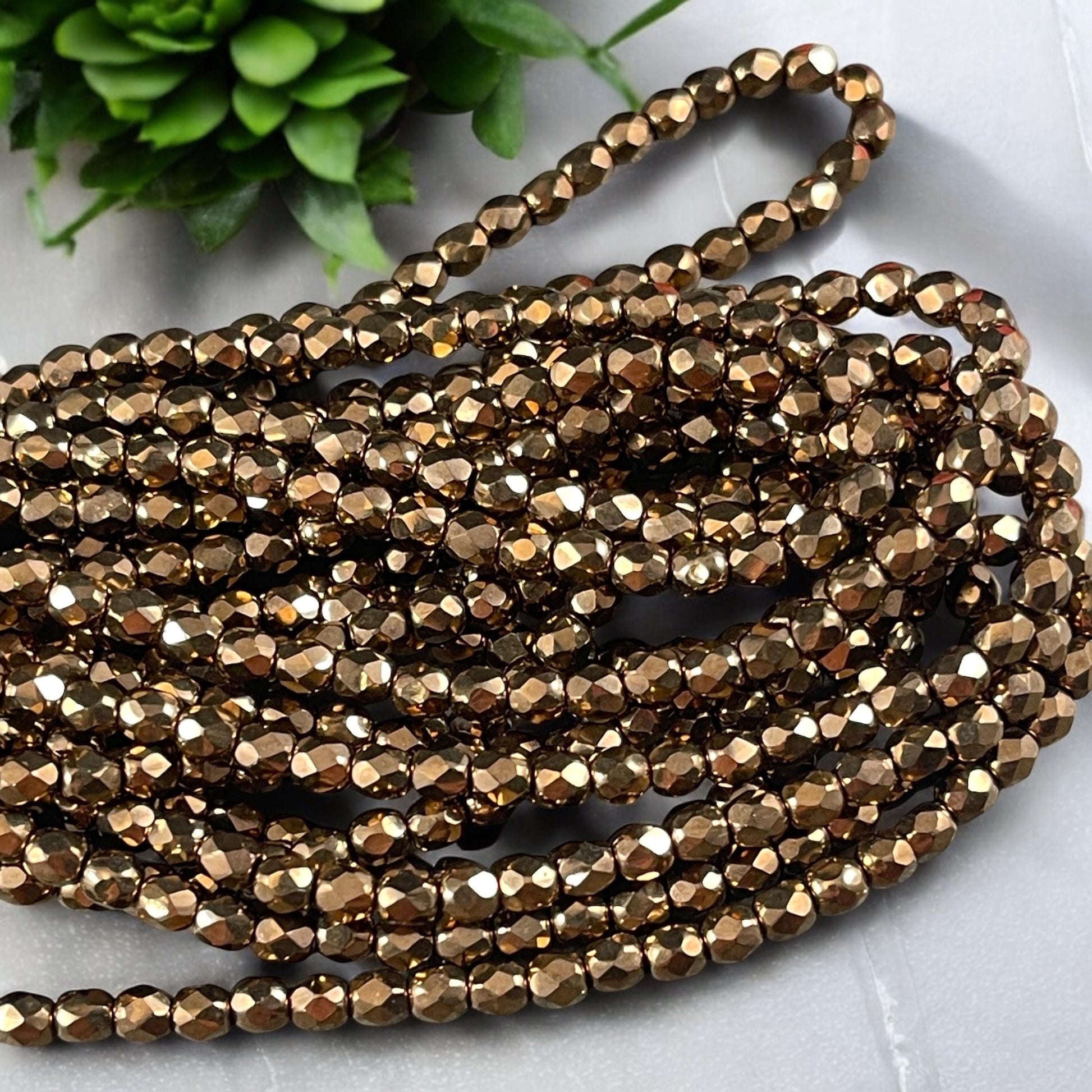 Czech Glass Beads - 4mm Metallic Bronze Faceted Glass Beads (FP4/N-114) * Qty. 50