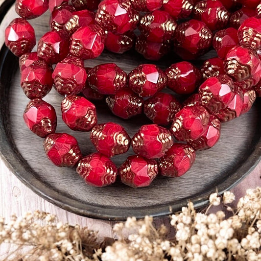 Czech Glass Beads, Red Cathedral 8x6mm Carved Oval Bicone (CTD/N-007) * Qty. 15