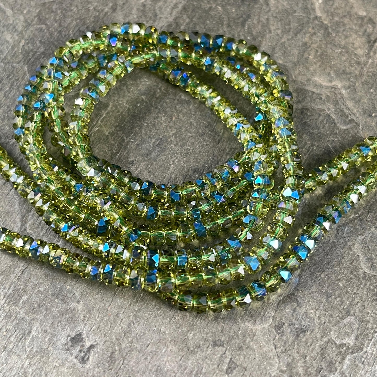 Faceted Glass Beads - 4x2.5mm Heishi Rondelles, Transparent Olive Green with Rainbow AB Finish (Olive-AB) * 7" Strand