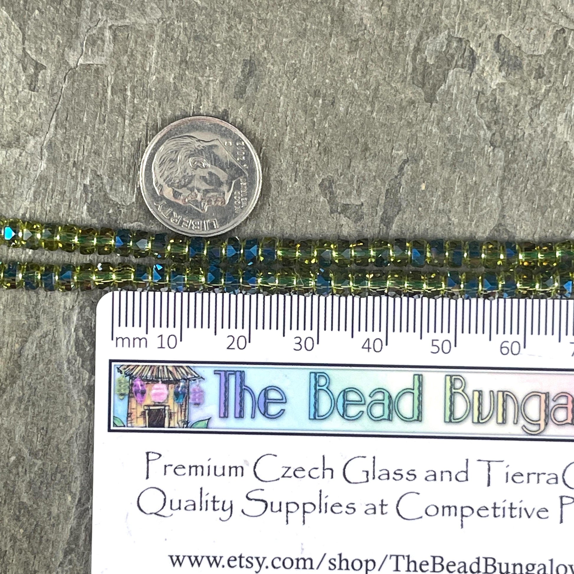 Faceted Glass Beads - 4x2.5mm Heishi Rondelles, Transparent Olive Green with Rainbow AB Finish (Olive-AB) * 7" Strand