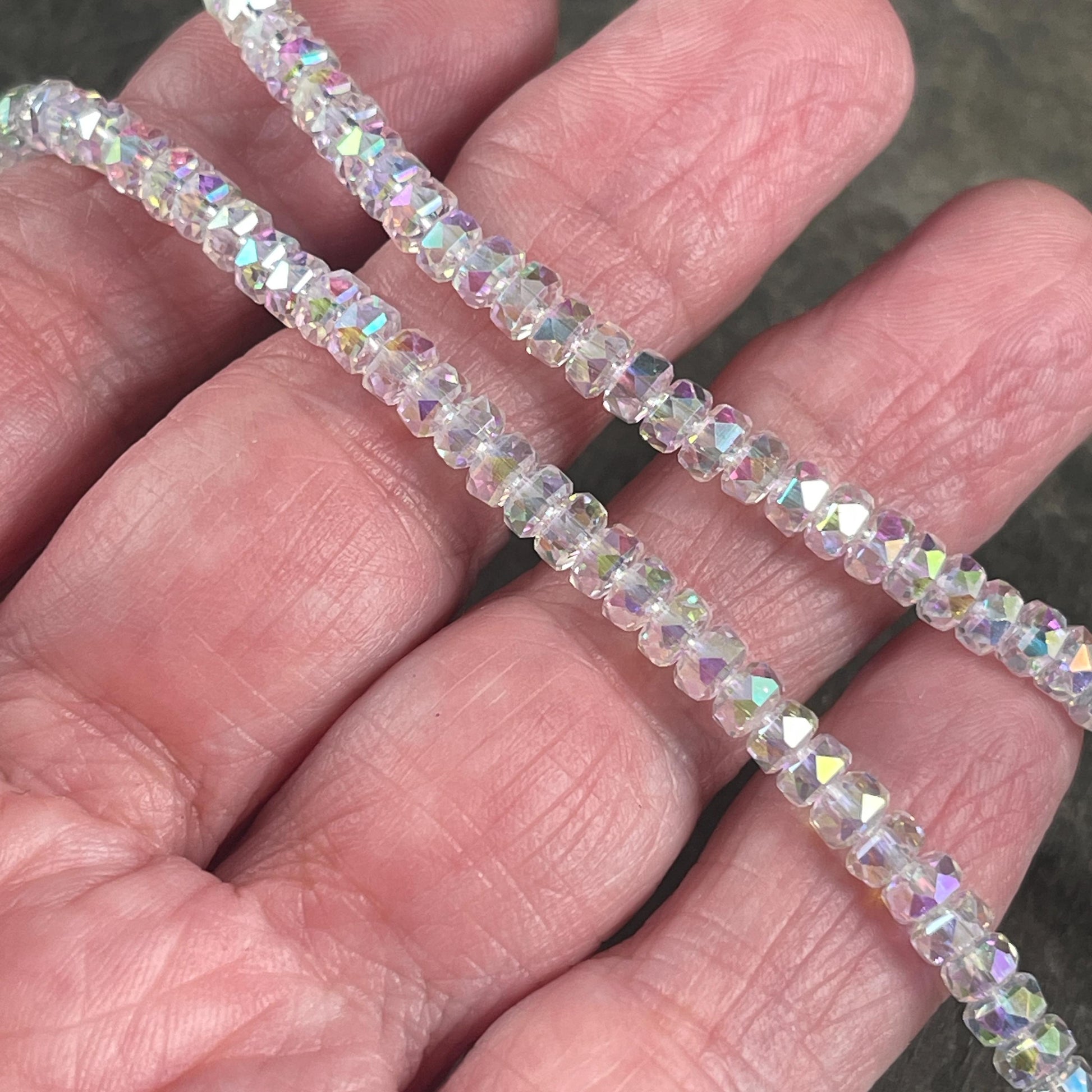 Faceted Glass Beads - 4x2.5mm Heishi Rondelles, Milky Crystal with AB Finish (Crystal AB) * 7" Strand