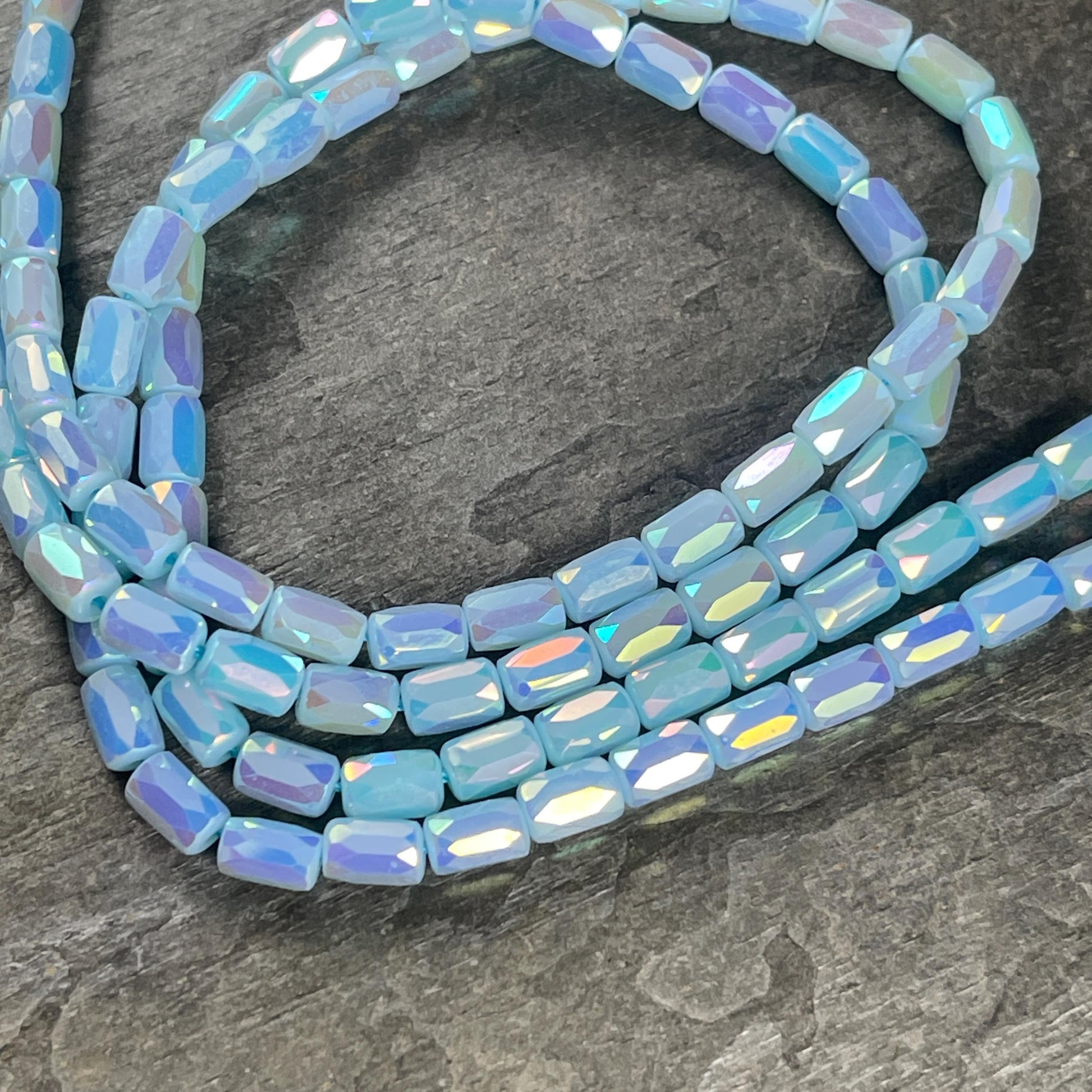 Faceted Glass Tube Beads, 7x4mm Tube Bead with Facets and AB Finish (BabyBlue) * 7" Strand