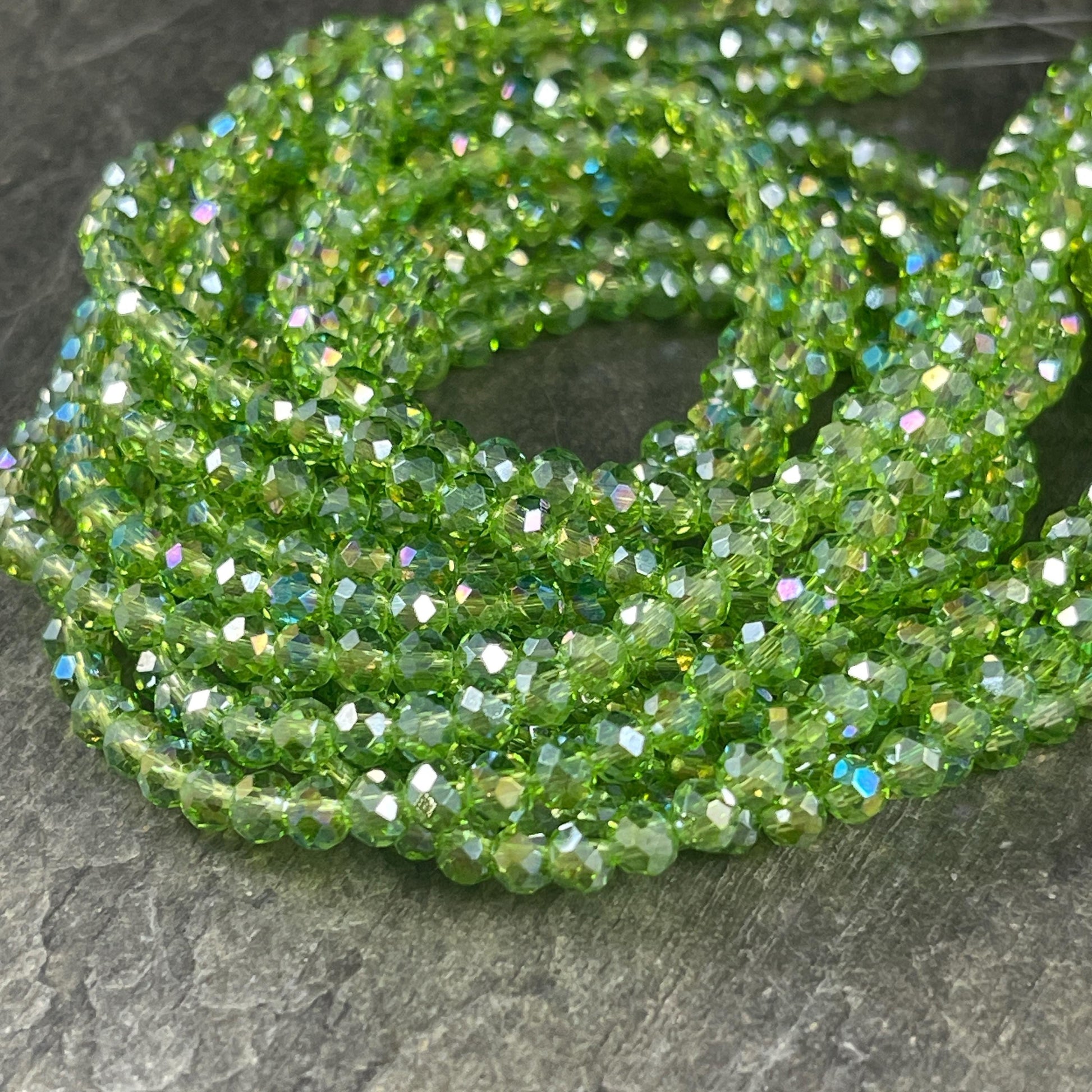 Transparent Green 4x3mm Faceted Glass Beads, Peridot Green with AB Finish (PeridotAB-4) * 100 Beads