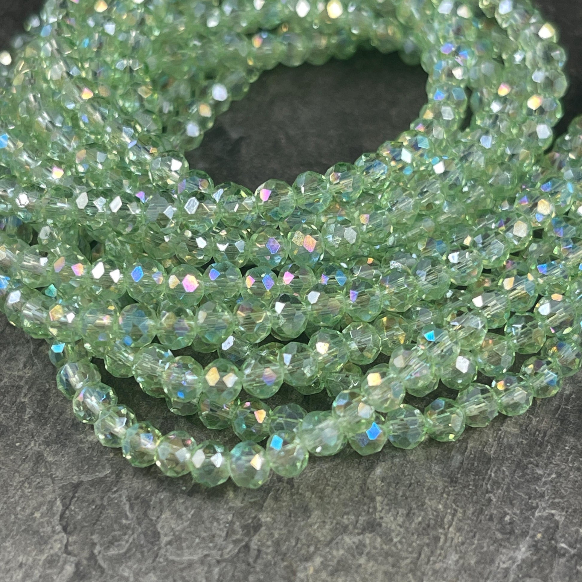 Transparent Light Green 4x3mm Faceted Glass Beads, Pastel Green with AB Finish (LtGreenAB-4) * 100 Beads