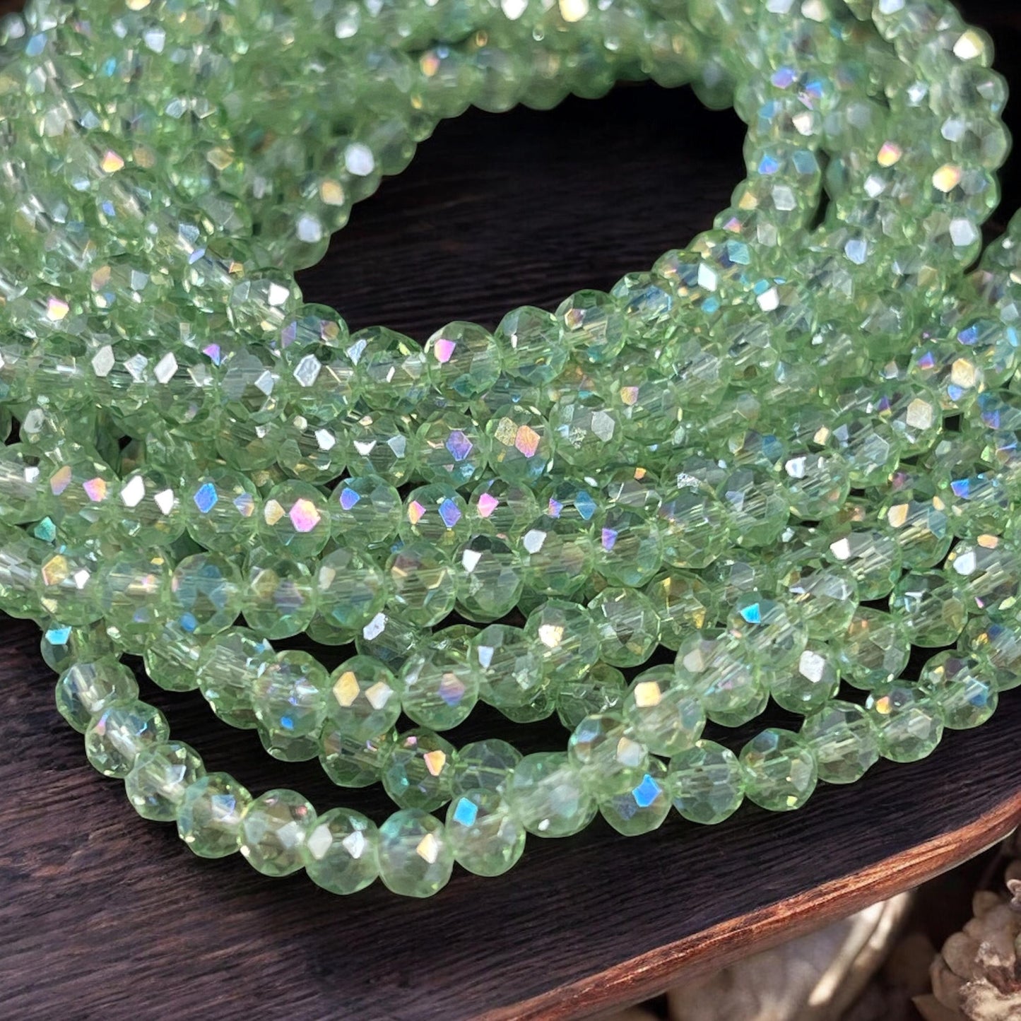 Transparent Light Green 4x3mm Faceted Glass Beads, Pastel Green with AB Finish (LtGreenAB-4) * 100 Beads