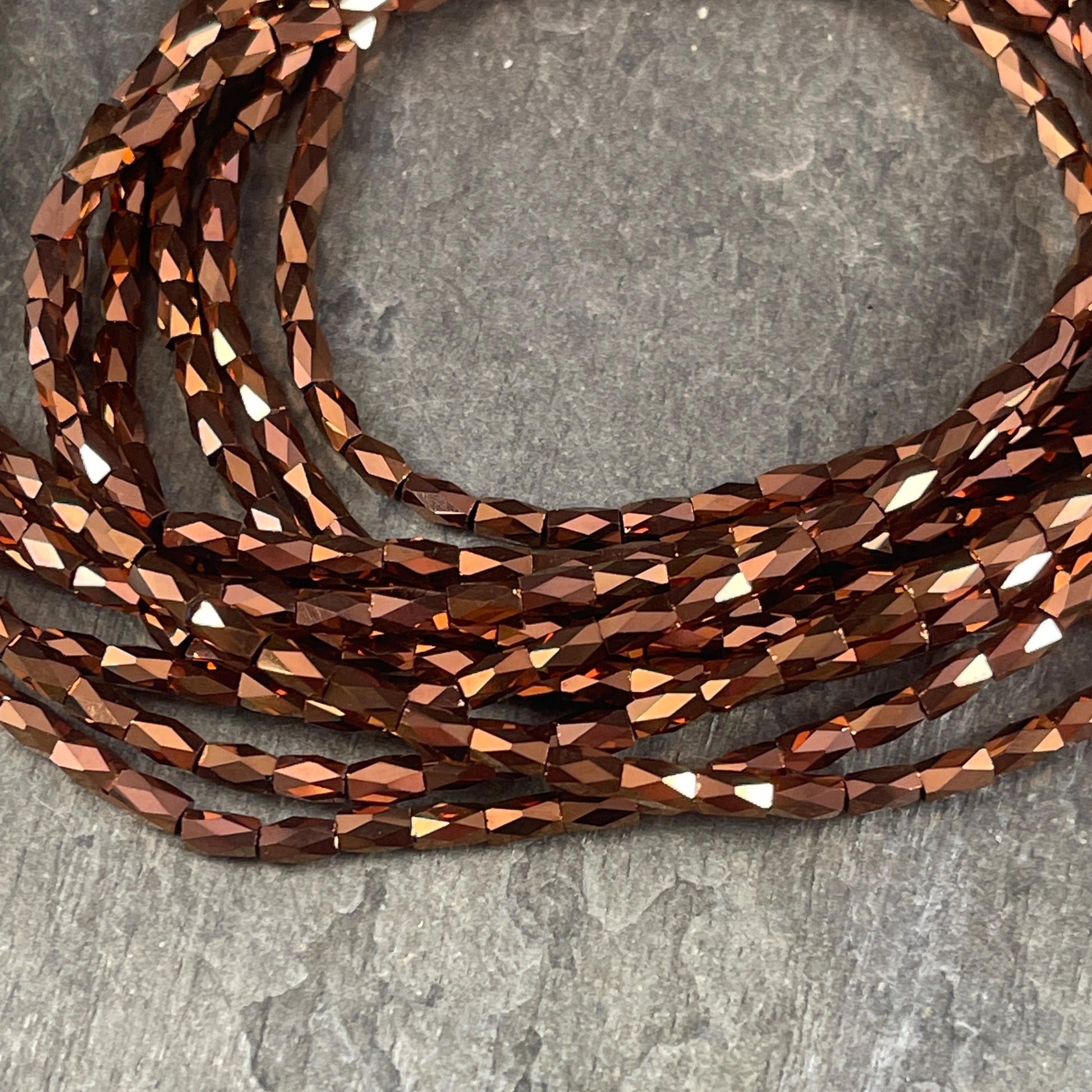 Skinny Faceted Tube Beads, 5x3mm Bronze Metallic Beads, Aged Copper Faceted Glass Beads (FGT-Bronze) * 18" Strand