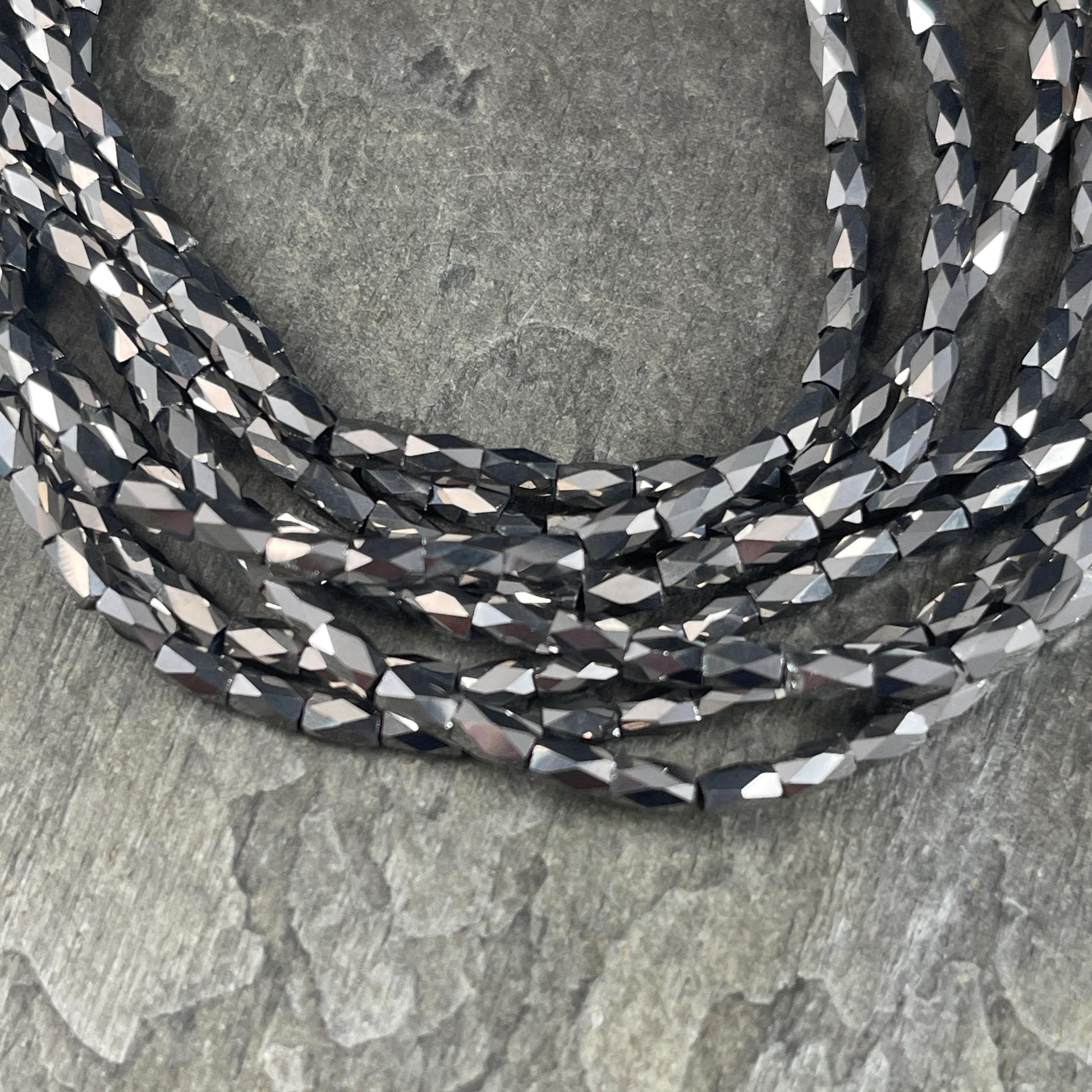 Skinny Faceted Tube Beads, 5x3mm Hematite Gray Beads, Dark Grey Faceted Glass Beads (FGT-Hematite) * 18" Strand
