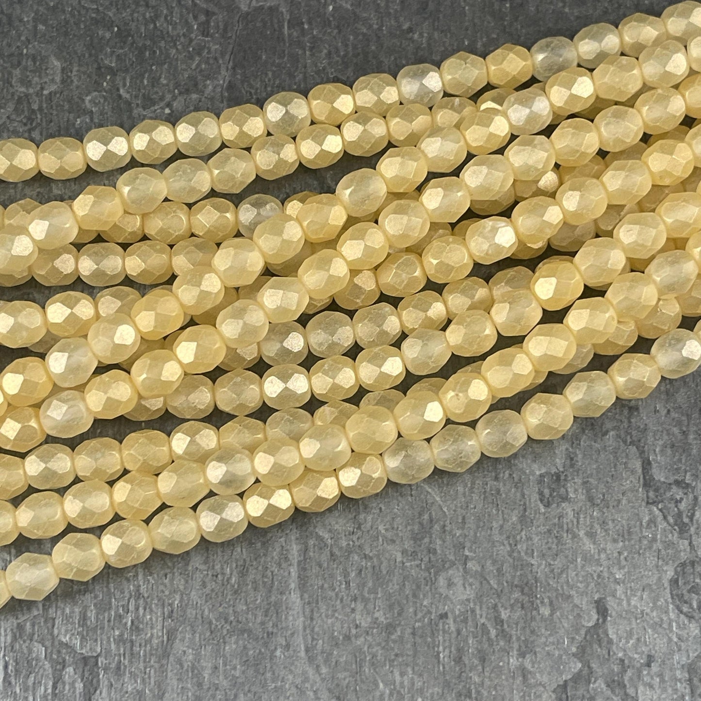 Czech Glass Beads - 6mm Faceted Round Beads, Soft Golden Yellow (FP6/SM-79081CR) * Qty. 25