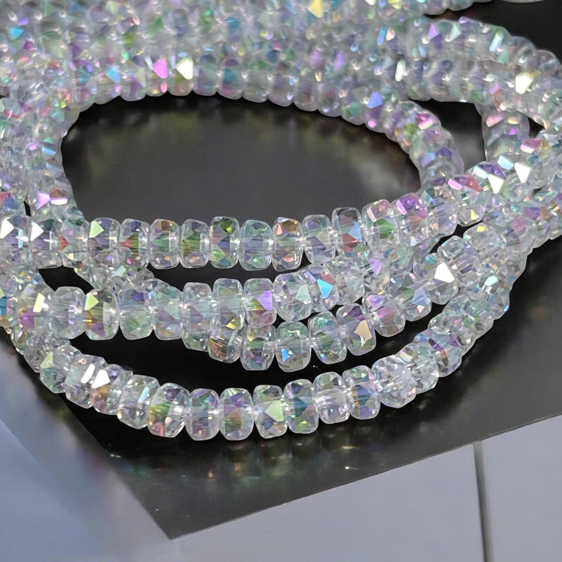 Faceted Glass Beads - 4x2.5mm Heishi Rondelles, Milky Crystal with AB Finish (Crystal AB) * 7" Strand