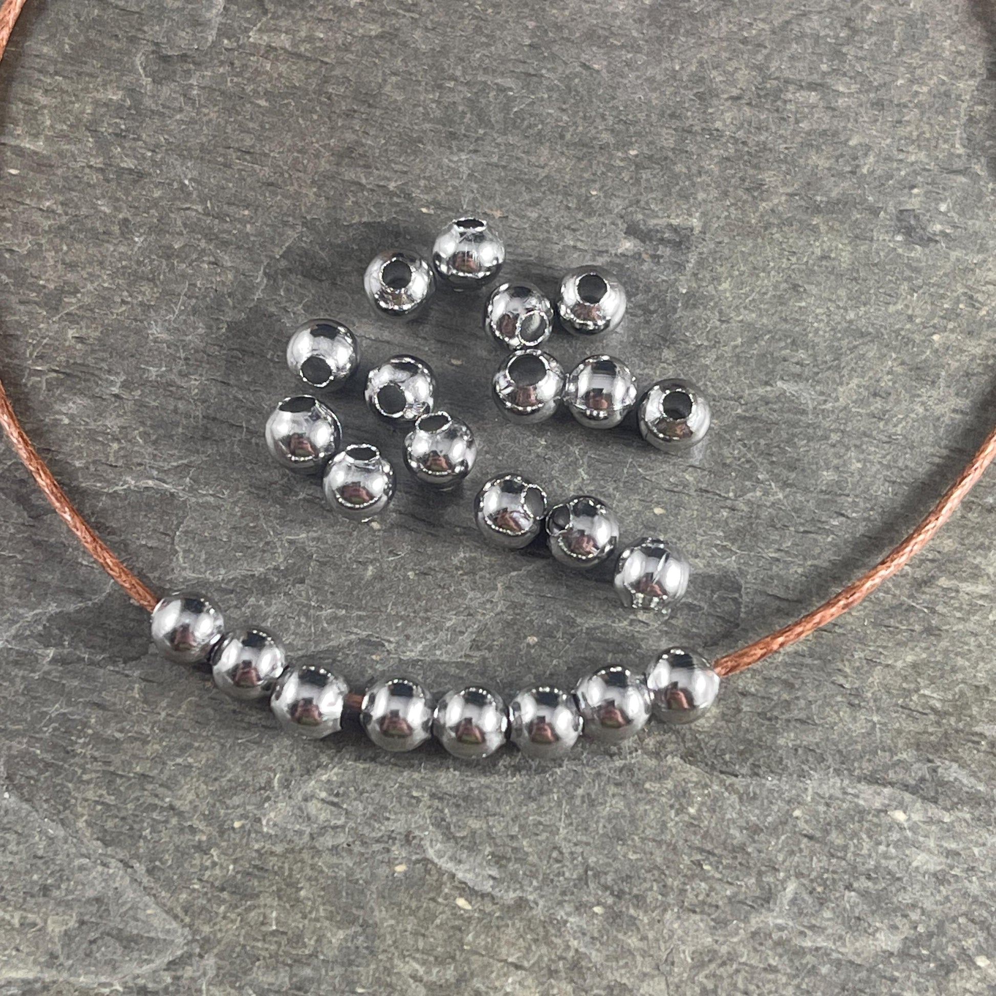 4mm Stainless Steel Round Beads - 1.6mm hole - Hollow, Lightweight (I050-4mm) * Qty. 75